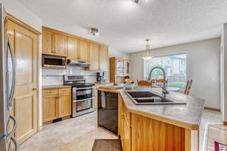 Photo 5: 333 Bridlewood Avenue SW in Calgary: Bridlewood Detached for sale : MLS®# A1244530