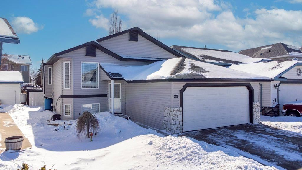 Main Photo: 308 Woodside Circle NW: Airdrie Detached for sale : MLS®# A2031889
