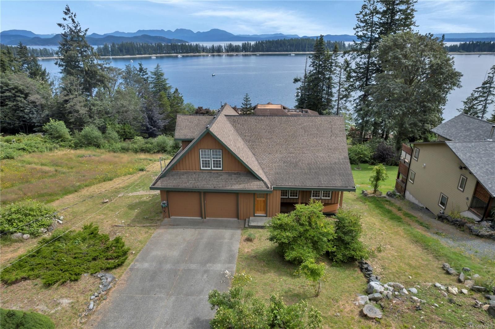 Heriot Bay oceanview home featuring panoramic views across Rebecca Spit Provincial Park!
