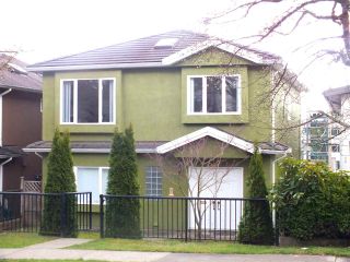 Photo 1: 3048 E 8TH Avenue in Vancouver: Renfrew VE House for sale (Vancouver East)  : MLS®# R2250637