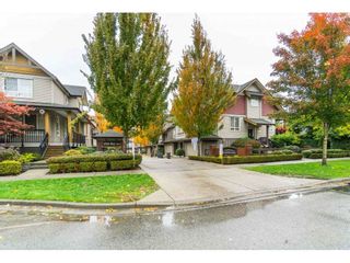 Photo 2: 42 16789 60 Avenue in Surrey: Cloverdale BC Townhouse for sale in "Laredo" (Cloverdale)  : MLS®# R2414492