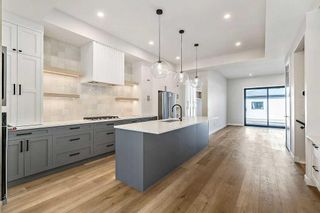 Photo 6: 418 24 Avenue NE in Calgary: Winston Heights/Mountview Semi Detached (Half Duplex) for sale : MLS®# A2126433