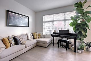Photo 4: 104 Walden Path SE in Calgary: Walden Row/Townhouse for sale : MLS®# A1159806