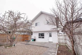 Photo 2: 60 Martinglen Mews NE in Calgary: Martindale Detached for sale : MLS®# A2129418