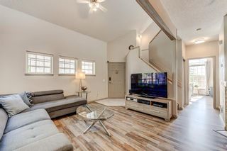 Photo 8: 801 1997 Sirocco Drive SW in Calgary: Signal Hill Row/Townhouse for sale : MLS®# A1235594