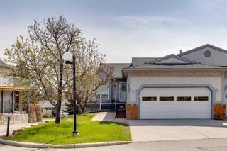 Main Photo: 100 Norquay Heights NW in Calgary: North Haven Semi Detached (Half Duplex) for sale : MLS®# A2053167