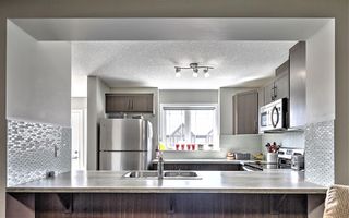 Photo 8: 114 Hillcrest Gardens SW: Airdrie Row/Townhouse for sale : MLS®# A1215843