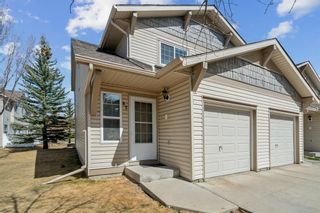 Photo 2: 82 Eversyde Court SW in Calgary: Evergreen Row/Townhouse for sale : MLS®# A2123607