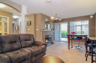 Photo 2: 121 22022 49 Avenue in Langley: Murrayville Condo for sale in "Murray Green" : MLS®# R2332969