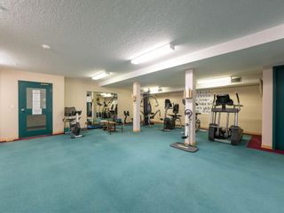 Photo 32: 124 7229 Sierra Morena Boulevard SW in Calgary: Signal Hill Apartment for sale : MLS®# A2035399