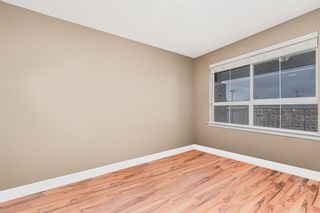 Photo 11: 409 35 Richard Court SW in Calgary: Lincoln Park Apartment for sale : MLS®# A2042034