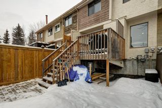 Photo 24: 143 Woodvale Bay SW in Calgary: Woodlands Row/Townhouse for sale : MLS®# A2022754