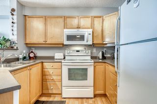 Photo 7: 409 16 Country Village Bay NE in Calgary: Country Hills Village Apartment for sale : MLS®# A2030230