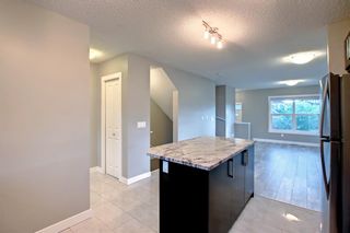 Photo 13: 105 1225 Kings Heights Way SE: Airdrie Row/Townhouse for sale : MLS®# A1233633