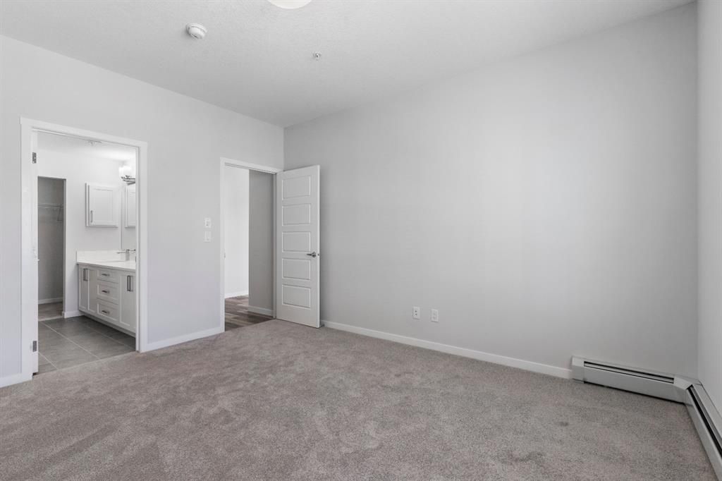 Photo 10: Photos: 309 300 Harvest Hills Place NE in Calgary: Harvest Hills Apartment for sale : MLS®# A1123007