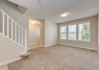 Photo 5: 59 Fireside Parkway: Cochrane Row/Townhouse for sale : MLS®# A2053037
