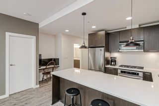 Photo 10: 239 721 4 Street NE in Calgary: Renfrew Apartment for sale : MLS®# A2051636