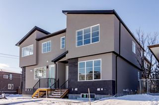 Main Photo: 4603 17 Avenue NW in Calgary: Montgomery Row/Townhouse for sale : MLS®# A1203798