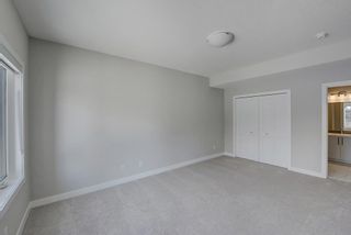 Photo 32: 908 Crestridge Common SW in Calgary: Crestmont Row/Townhouse for sale : MLS®# A2030391