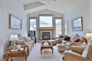 Photo 7: 12 Strathridge Way SW in Calgary: Strathcona Park Detached for sale : MLS®# A2046710