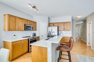 Photo 2: 92 Rockyspring Grove NW in Calgary: Rocky Ridge Semi Detached (Half Duplex) for sale : MLS®# A2118068