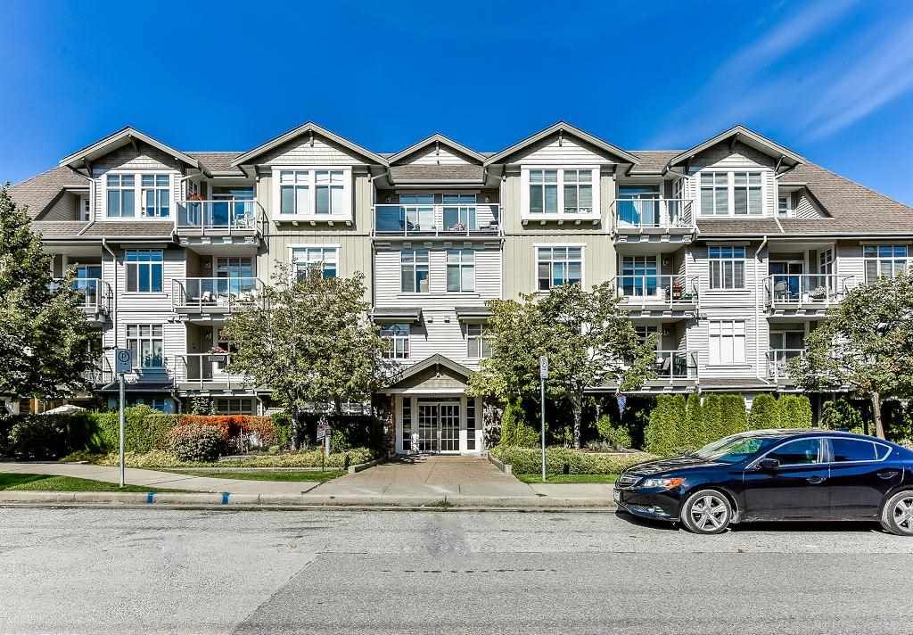 Main Photo: 404 15323 17A Avenue in Surrey: King George Corridor Condo for sale in "SEMIAHMOO PLACE" (South Surrey White Rock)  : MLS®# R2308322