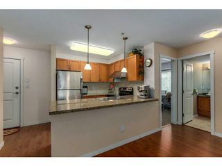 Photo 2: 108 2373 ATKINS Avenue in Port Coquitlam: Central Pt Coquitlam Condo for sale in "CARMANDY" : MLS®# V1136914