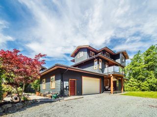 Photo 1: 1011 PANORAMA Place in Squamish: Hospital Hill House for sale in "Smoke Bluff" : MLS®# R2862936