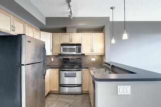 Photo 10: 4 145 Rockyledge View NW in Calgary: Rocky Ridge Apartment for sale : MLS®# A1041175