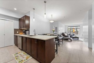 Photo 1: 106 16 Auburn Bay Link SE in Calgary: Auburn Bay Apartment for sale : MLS®# A2140723