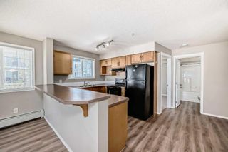 Photo 8: 1306 5 Country Village Park NE in Calgary: Country Hills Village Apartment for sale : MLS®# A2130261