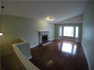 Photo 2: 1386 SUTHERLAND AV in Port Coquitlam: Oxford Heights House for sale : MLS®# V1104543