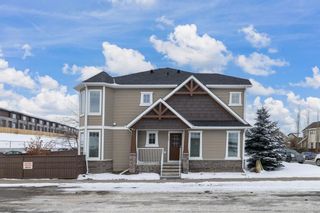 Photo 1: 65 Aspen Hills Drive SW in Calgary: Aspen Woods Row/Townhouse for sale : MLS®# A2031232