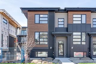 Main Photo: 73 Lucas Way in Calgary: Livingston Row/Townhouse for sale : MLS®# A2132753