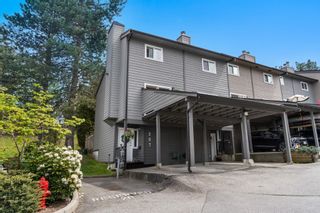 Photo 1: 257 BALMORAL Place in Port Moody: North Shore Pt Moody Townhouse for sale in "Balmoral Place" : MLS®# R2880058
