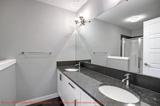 Photo 10: 51 Sundown Manor: Cochrane Semi Detached (Half Duplex) for sale : MLS®# A1256051