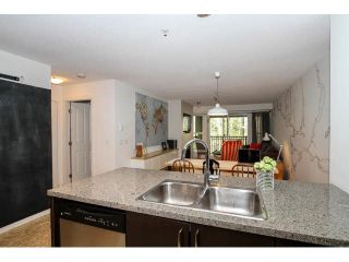 Photo 3: 309 3050 DAYANEE SPRINGS BL Boulevard in Coquitlam: Westwood Plateau Condo for sale in "BRIDGES" : MLS®# V1111304