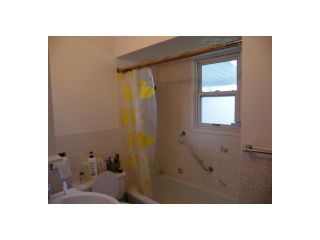 Photo 6: 1025 COMO LAKE AV in Coquitlam: Harbour Chines House for sale : MLS®# V1112158