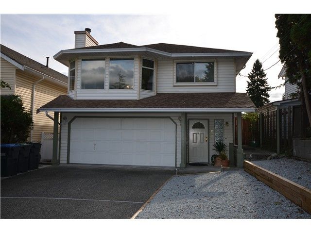 Main Photo: 1968 LANGAN Avenue in Port Coquitlam: Lower Mary Hill House for sale in "LOWER MARYHILL" : MLS®# V988426