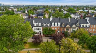 Photo 1: 26 Somme Boulevard SW in Calgary: Garrison Woods Row/Townhouse for sale : MLS®# A2018331