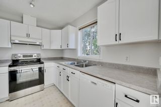 Photo 11: 8319 160 Avenue in Edmonton: Zone 28 House Half Duplex for sale : MLS®# E4392626