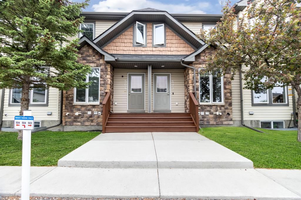 Main Photo: 504 2445 Kingsland Road SE: Airdrie Row/Townhouse for sale : MLS®# A2054140