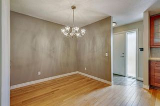 Photo 4: 302 120 Silvercreek Close NW in Calgary: Silver Springs Row/Townhouse for sale : MLS®# A1184068