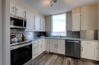 Photo 12: 1001 145 Point Drive NW in Calgary: Point McKay Apartment for sale : MLS®# A1239089