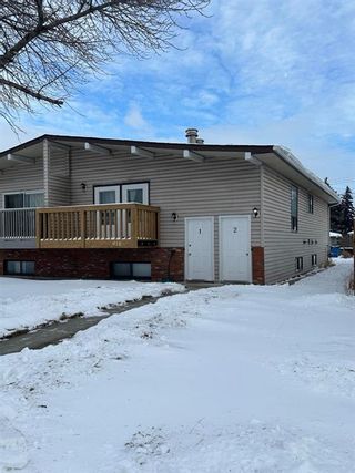 Photo 1: 918 40 Street SE in Calgary: Forest Lawn Semi Detached (Half Duplex) for sale : MLS®# A2132383