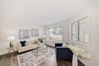 Photo 4: 59 Sandarac Circle NW in Calgary: Sandstone Valley Row/Townhouse for sale : MLS®# A2116581
