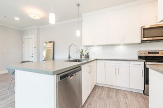 Photo 5: 303 2229 ATKINS Avenue in Port Coquitlam: Central Pt Coquitlam Condo for sale in "Downtown Pointe" : MLS®# R2773392