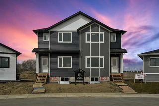 Main Photo: 105 Gray Close: Sylvan Lake Semi Detached (Half Duplex) for sale : MLS®# A2127937