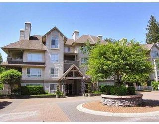 Photo 1: 110 1242 TOWN CENTRE Boulevard in Coquitlam: Canyon Springs Condo for sale in "THE KENNEDY" : MLS®# V811939