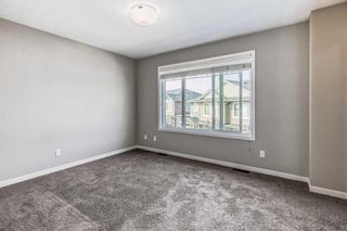 Photo 16: 227 Panatella Walk NW in Calgary: Panorama Hills Row/Townhouse for sale : MLS®# A2074189
